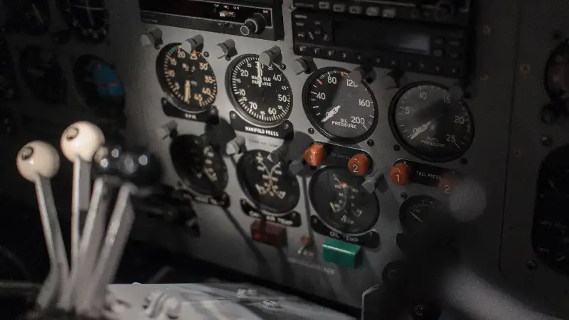 Dials, gauges, and controls from an aircraft cockpit
